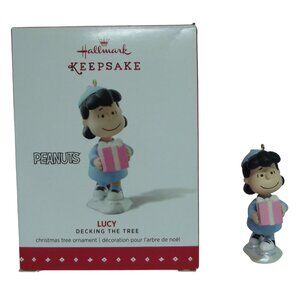 Hallmark Ornament 2015 Keepsake Peanuts Lucy Decking the Tree pink gift package